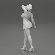 Beautiful woman in a dress walking with hand on head - Only-Games