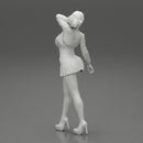 Beautiful woman in a dress walking with hand on head - Only-Games