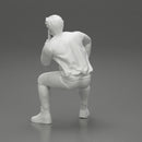 man in leather jacket sitting in thinking pose - Only-Games