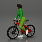 Young sexy sporty woman in pants and snickers short haired posing with bicycle - Only-Games