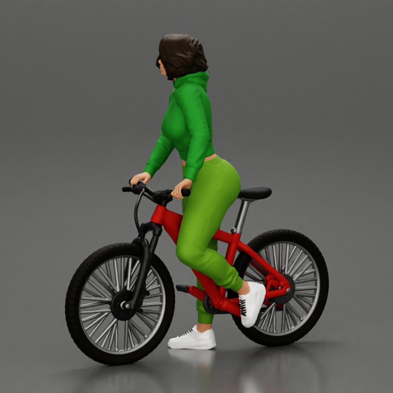 Young sexy sporty woman in pants and snickers short haired posing with bicycle - Only-Games