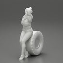 sexy girl in jacket and pants sitting  and hands in hair - Only-Games