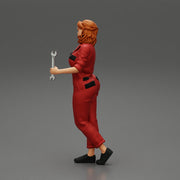 Tired woman mechanic holding a spanner - Only-Games
