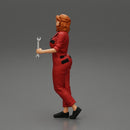 Tired woman mechanic holding a spanner - Only-Games