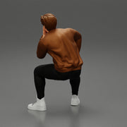 man in leather jacket sitting in thinking pose - Only-Games