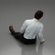 Accident of a male worker sitting on the floor with an injured - Only-Games