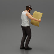 Young Man in hat with beard Holding Map And Looking At it - Only-Games