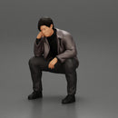 Worried man in a leather jacket sitting and thinking - Only-Games