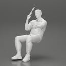 Gangster sitting at the table with a glass of whisky holding gun and playing poker - Only-Games