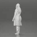 beautiful girl in large jeans and a long coat thinking - Only-Games