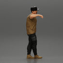 gangster man standing and leaning against the wall in cap - Only-Games