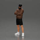 Confident man posing with folded arms, exuding a casual vibe - Only-Games