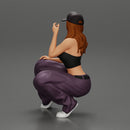 Chola gangster homie lowrider girl in cap sitting beside car - Only-Games