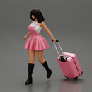 2 Young woman in sexy dress and boots pulling suitcase  walking in airport terminal - Only-Games