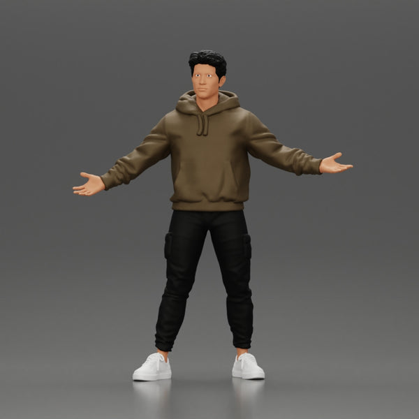 Asian Man Standing in Hoodie with Raised Hands