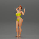 young girl posing and riding on the surfboard at the beach - Only-Games