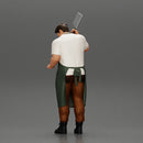 butcher standing while holding a cleaver and cutting something - Only-Games