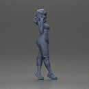 Curly-Haired Woman in Vibrant Green Outfit Striking a Pose - Only-Games