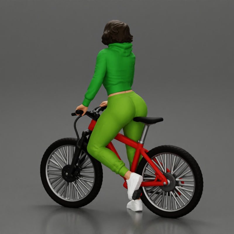 Young sexy sporty woman in pants and snickers short haired posing with bicycle - Only-Games