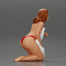 Sexy girl in bikini sitting and covering her body by towel - Only-Games