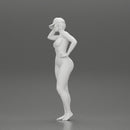 Naked Asian girl in cap standing and thinking - Only-Games