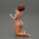 Sexy girl in bikini with short hair sitting on her knees - Only-Games