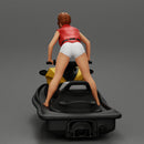 Beautiful girl riding standing up on a speeding jetski - Only-Games
