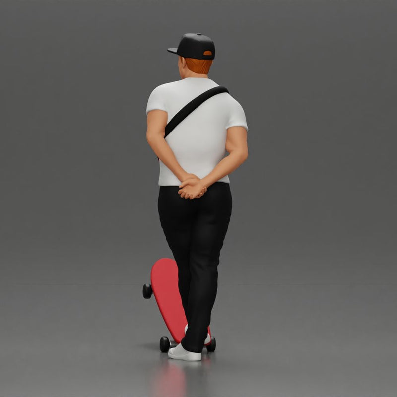 skater man leaning against the wall wearing a cap and banana bag