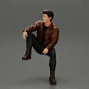 Handsome Young Man in Leather Jacket Looking Away while Sitting - Only-Games
