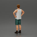 Man standing with his hands on his hips thinking and wondering - Only-Games