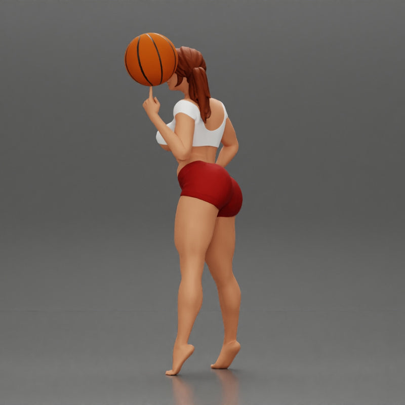 Sexy Young Sporty Girl Playing With the Ball on the Basketball - Only-Games