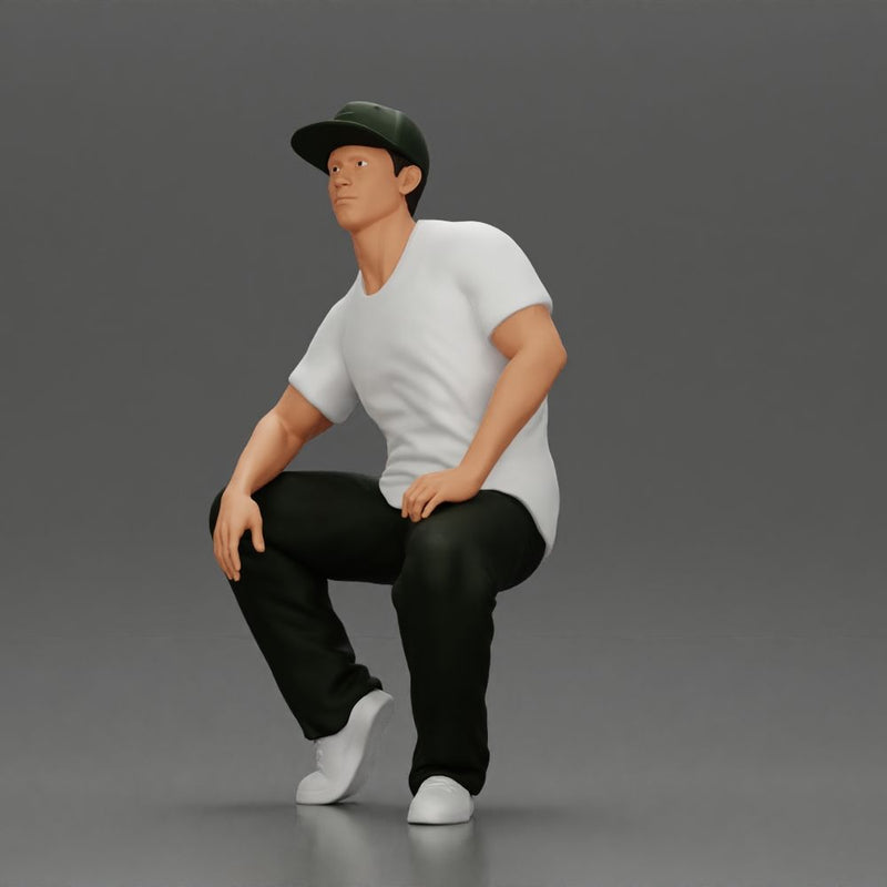 hip-hop man sitting in shirt and cap