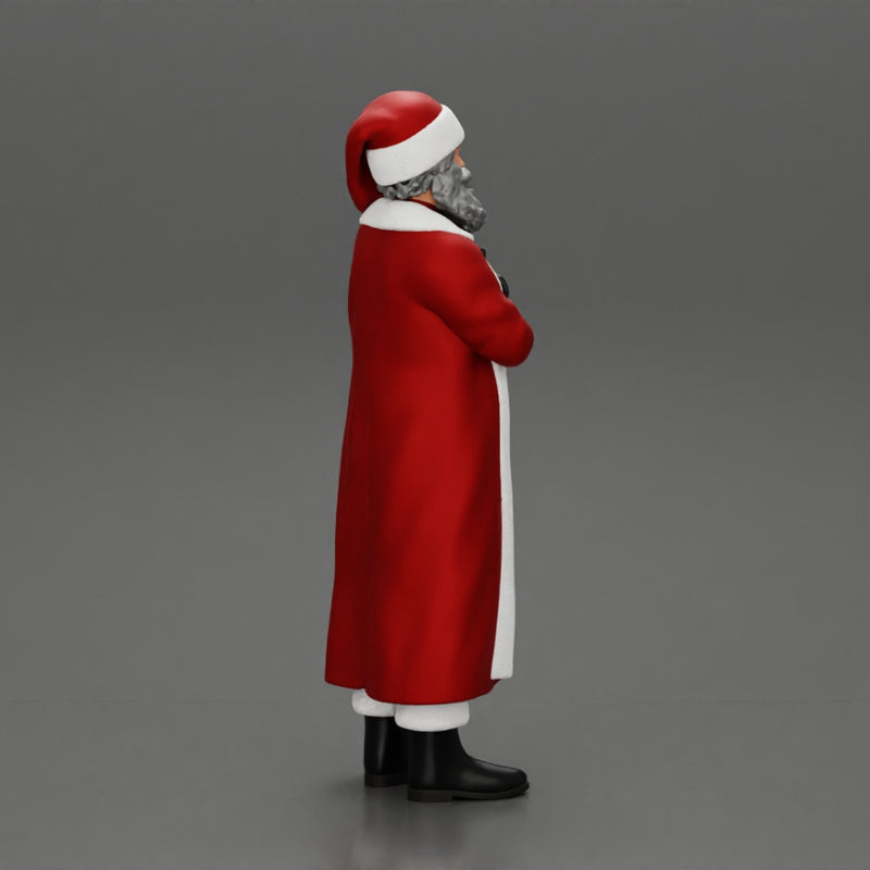 Santa Claus stands with his arms crossed