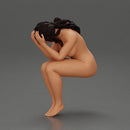 naked sad girl sitting and crying with her hands covering her face - Only-Games