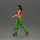 Woman Confidently Walks Forward in Stylish Green and Red Outfit - Only-Games