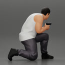 Gangster in pants sitting and holding a gun hides behind the car - Only-Games