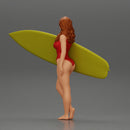 Attractive Young Woman Walking on Beach Holding Surfboard 2 - Only-Games