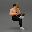 gangster man in a cap sitting holding a baseball bat and smoking - Only-Games