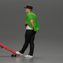 skater man leaning against the wall wearing a cap open shirt and banana bag - Only-Games