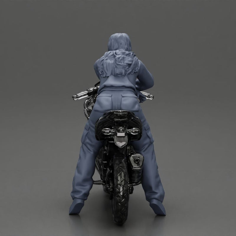 motorcyclist woman hoodie sitting on motorcycle