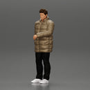 Man in long puffer jacket standing with his hand in his pocket lost in thought - Only-Games