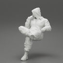 man in leather jacket and jeans sitting cross legged and thinking - Only-Games