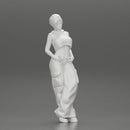 Chola girl Leaning On A Wall While Holding Her Legs Crossed - Only-Games