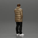 Man in long puffer jacket standing with his hand in his pocket lost in thought - Only-Games