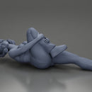 woman in bra lying on the floor touching her injured knee - Only-Games