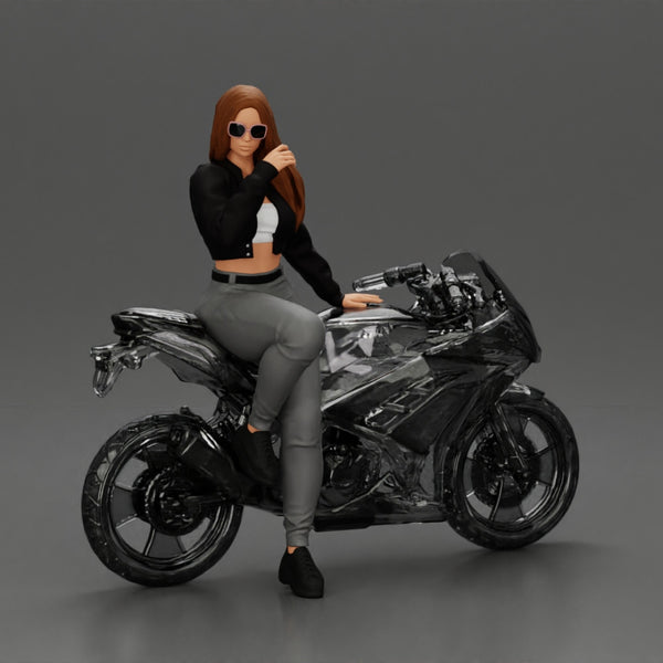 Beautiful girl in sunglasses and  mini jacket sitting on the motorbike