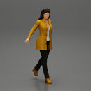 Business woman in manteau dragging suitcase  walking in airport terminal - Only-Games