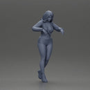 Sexy girl in mini skirt and shorts looking out over the edge of the stairs - Only-Games