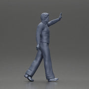 man in suit raising hand up walking - Only-Games