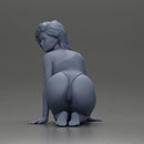 Beautiful Woman in One-Piece Bikini in a Kneeling Pin-Up Pose on the Beach - Only-Games